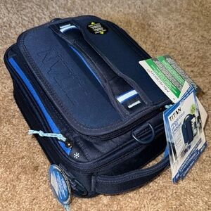 New with tags; Blue/Blue; Expandable lunch box; Titan